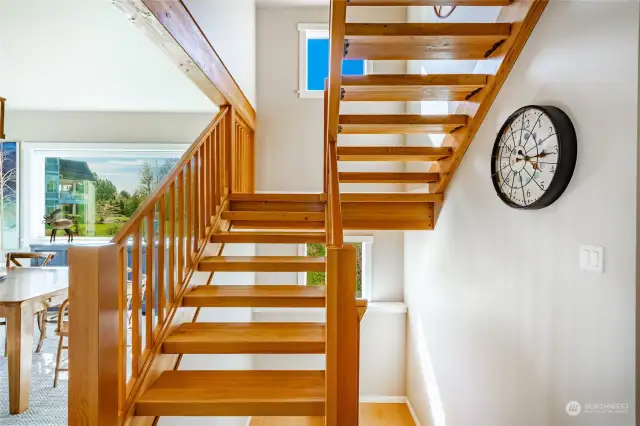 Beautiful wide fir stairs going up to the second floor.