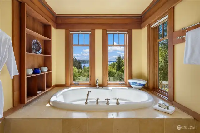 Your jetted tub awaits; soak in the magnificent views and forest greens!
