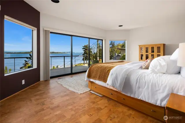Spacious owner's suite with sweeping views of the Sound and Seattle skyline