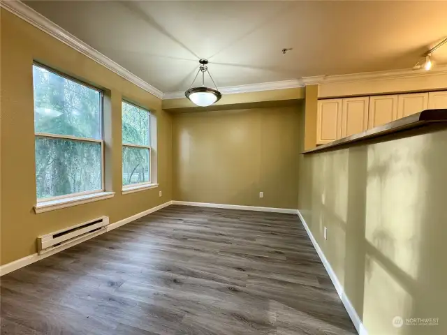 Dinning room and Breakfast Bar & crown molding around living room and kitchen