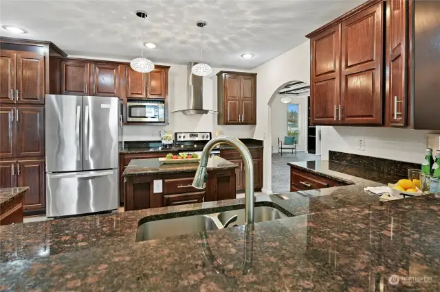 All this beautiful counter space, plenty of room to spread out! Yes, this stunning granite was definitely an upgrade. :)