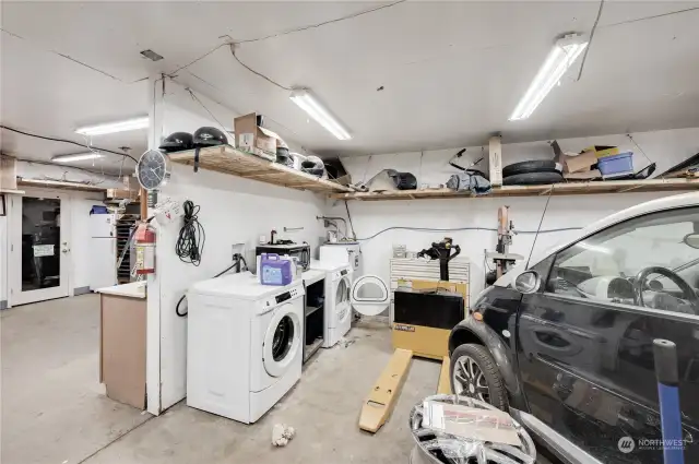 Laundry room in detached garage.