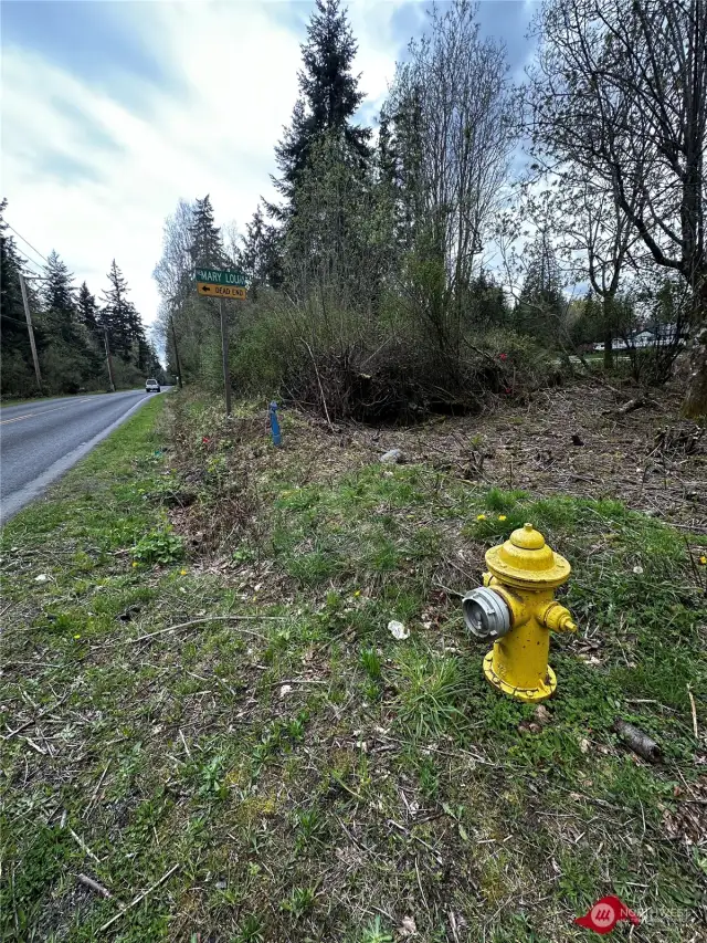 Access property by Fire Hydrant opposite Mary Lou. Park on Mary Lou, maybe behind the mail boxes.