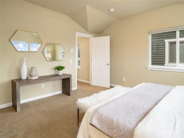 The primary bedroom is on the upper level and offers a walk-in closet as well as a 3/4 bath with oversized tiled shower