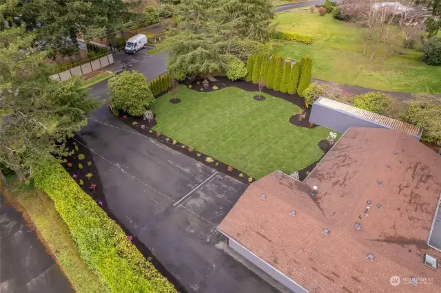 Aerial view of your beautiful entrance and front yard.