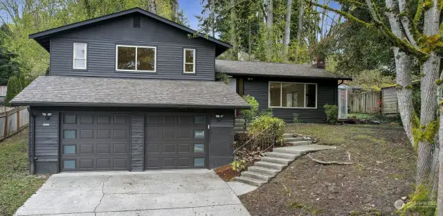 Welcome to the Highlands of Kirkland and this updated tri level on a private lot.   2 car attached garage and off street parking.