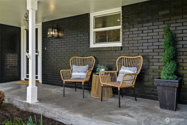 Sit and enjoy the neighborhood from your front porch