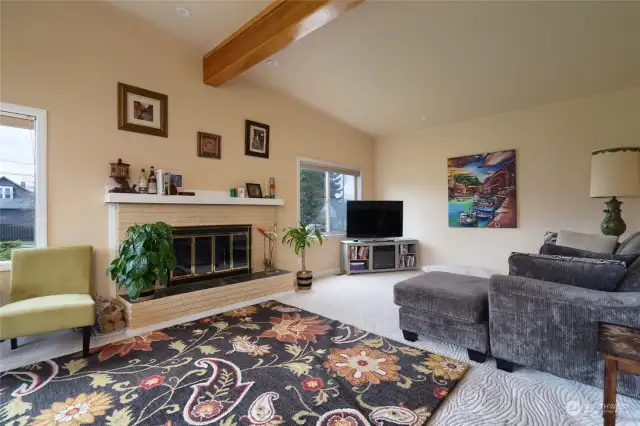 Unit 1107 - Living room with wood fireplace