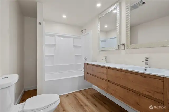 Primary bedroom bathroom with double sink.
