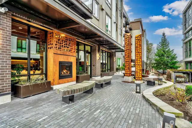 Walk across the street to pick up a coffee and enjoy it in the patio with dual sided fireplace.