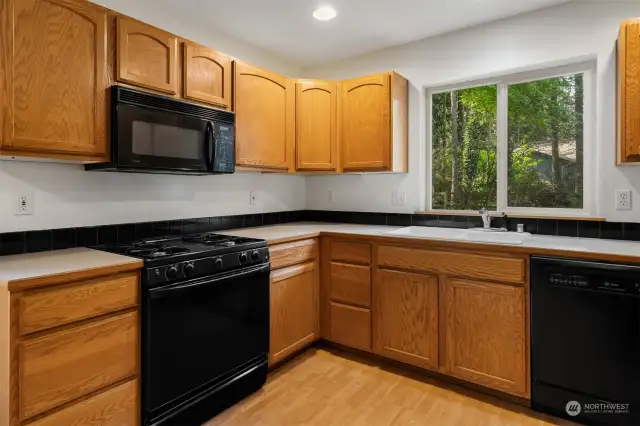 All appliances stay in Kitchen including dishwasher, refrigerator, stove/range, and microwave.