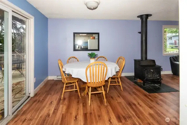 Dining area next to a cozy wood stove for those chilly winter days.