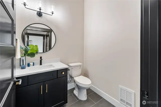 Downstairs powder room is connected to the office which could be utilized as a bedroom if desired.
