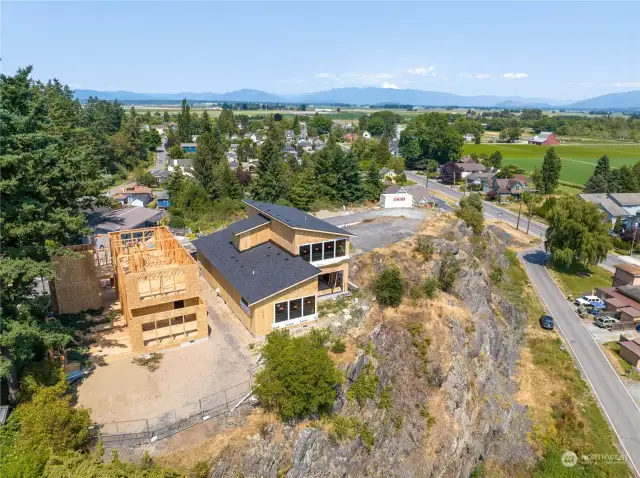 The first two in the collection of exquisite homes built by award winning local builder, BYK Construction! Can you see the peak of majestic Mt. Baker?