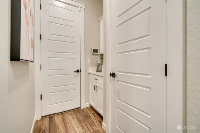 Entry from garage with "key drop" counter area and coat closet.