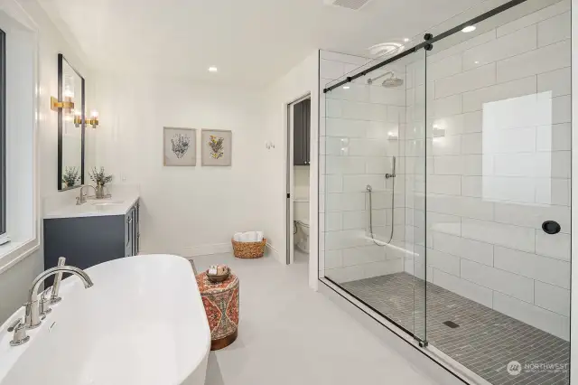 Luxury and comfort abounds in the en suite bath.