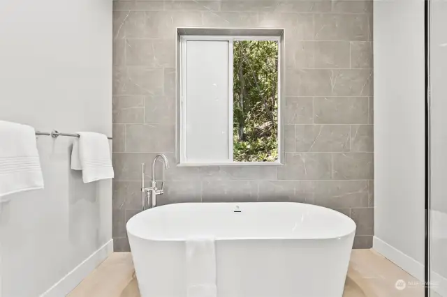 Primary Luxurious Soaking Tub w/view of Forest