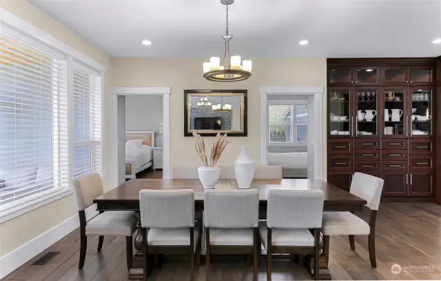 Large dining space with full wall cabinetry and scenic view of the open space.