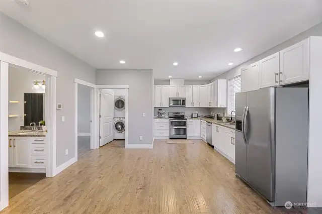 Featuring 1,026 sqft of livable area, open space concept with a kitchen, small dining area, and living room, with a separate foyer and entry closet, 1 Bedroom, full bathroom, office room, and laundry room.