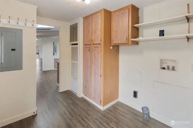 Utility room, serves as entrance to home.
