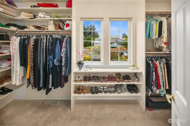 Dressing room with custom built-in closets.