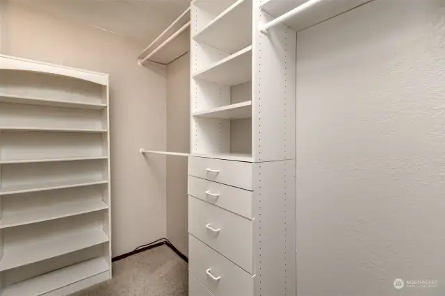 The walk in closet is ready for your move in day.