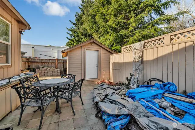 Private fenced patio needing new owner to complete build out i.e. fire pit, flower beds etc.
