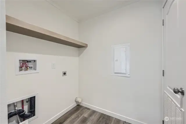 Spacious laundry room off of kitchen,
