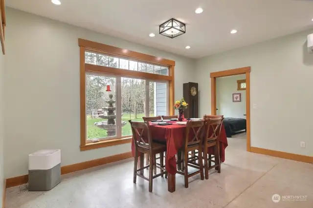 Dining space opens to the kitchen and living room.