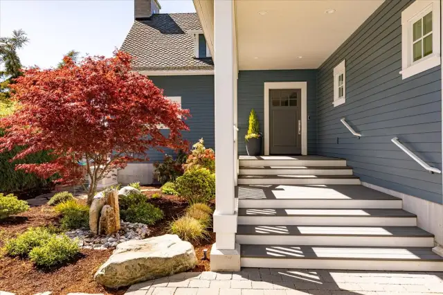 Entry courtyard with its beautiful maple tree and water feature