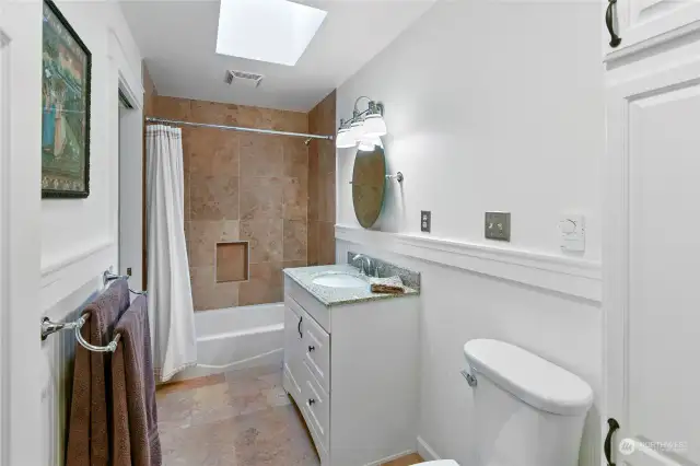 Main bathroom.  Radiant heated tile floor for your toasty toes.  All new updates.