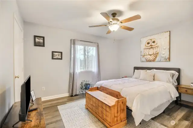 Additional bedroom with a ceiling fan.