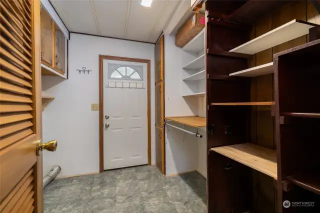 Spacious laundry room with lots of storage