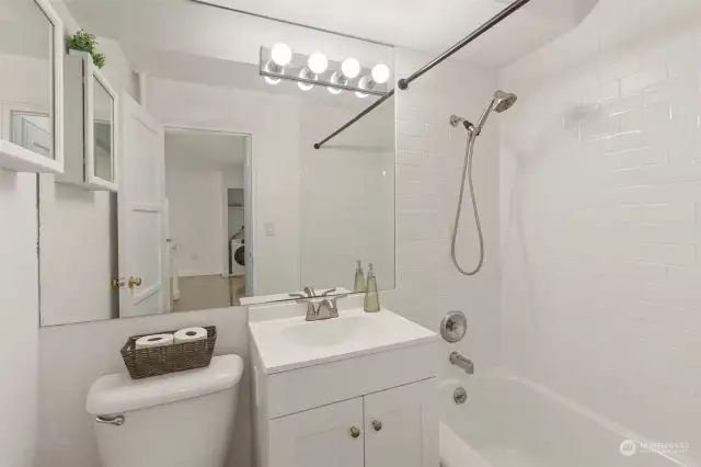 Recently updated full bath w/ brand new shower tiling