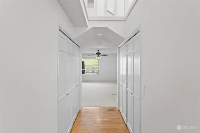 Entry hall is open above to the second level, allowing light to shine in from the skylight above. Two large closets to keep your coats and other belongings neatly tucked away.