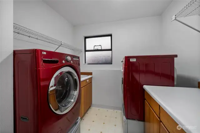 Going to the lower level - Check out the size of the laundry room with washer & dryer + utility sink