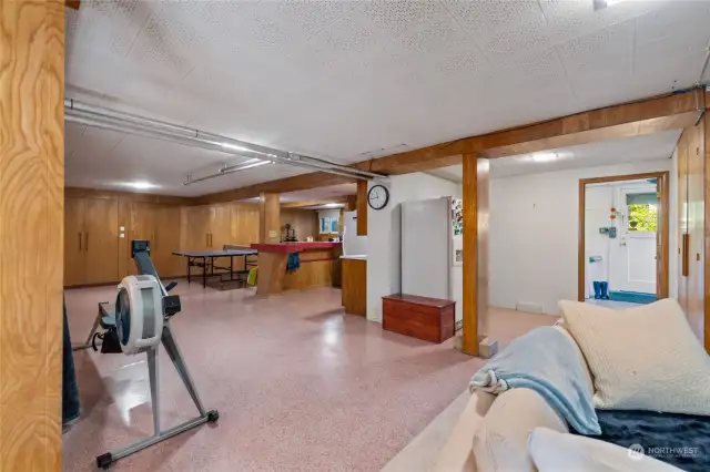 The home continues to amaze you with this mostly finished basement with full height ceilings and beautiful birch paneling.