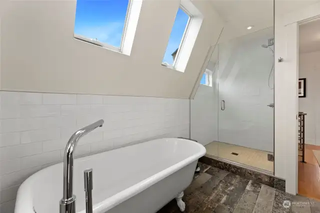 Heated floors and a walk -in shower also grace this spa-like bathroom.