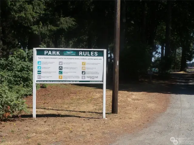 Front entrance and parking area of the park and Scott Lake