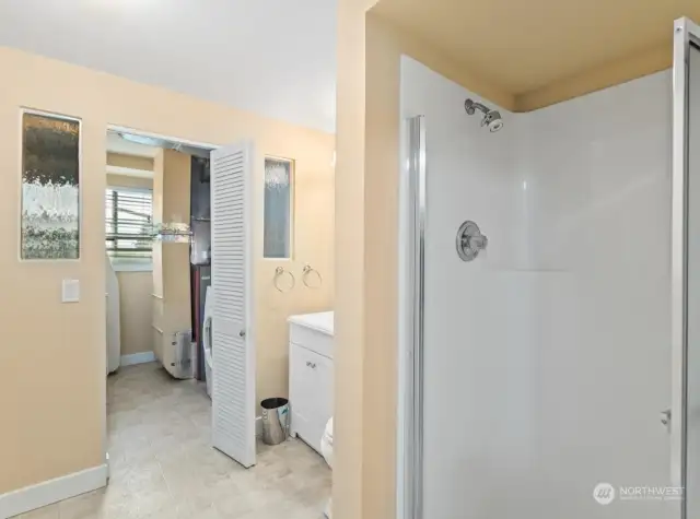 Downstairs bath is 3/4 & leads to Utility / laundry area.
