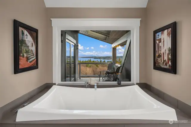 Unwind in this large soaking tub overlooking your private terrace with a view. Life is good!