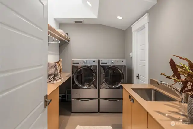 Yes even the laundry rooms is gorgeous with heated floors, skylight, and custom cabinetry. PLUS more storage, keeping your home organized.