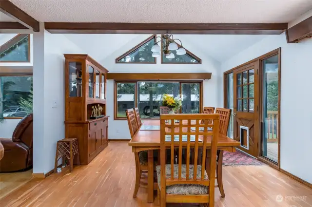 Separate dining room with vaulted ceilings and lots of light