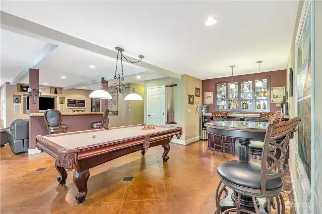 Downstairs is Pool Table, TV, Wet Bar.