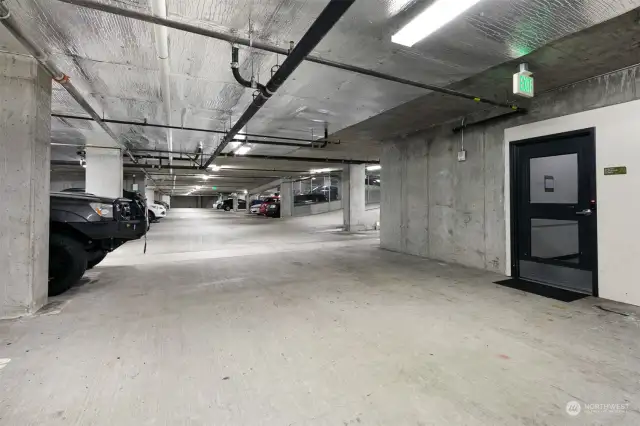 Secure parking garage, dedicated parking spot, additional storage