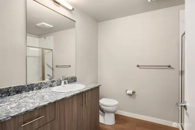 Lots of counter space and storage in bathroom