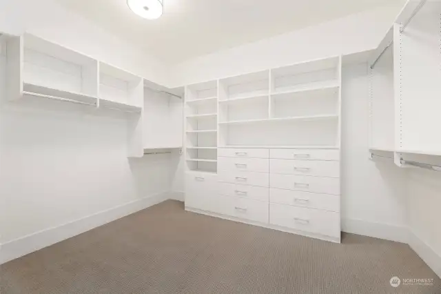 Custom Melamine Closet System with Hanging Spaces, Shelves and Drawers.
