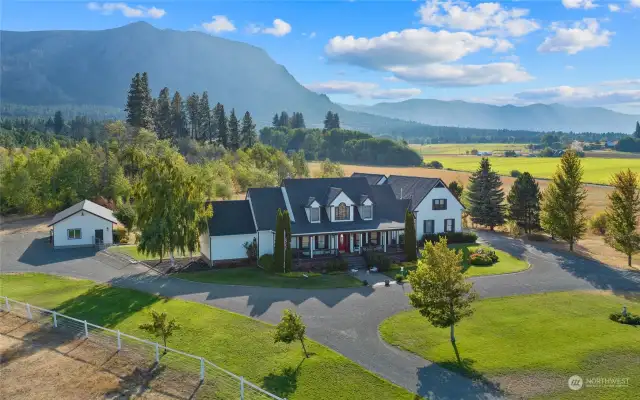 Situated at the end of the driveway and at the base of Peoh Point, the original Farmhouse with attached apartment presents an array of promising possibilities.