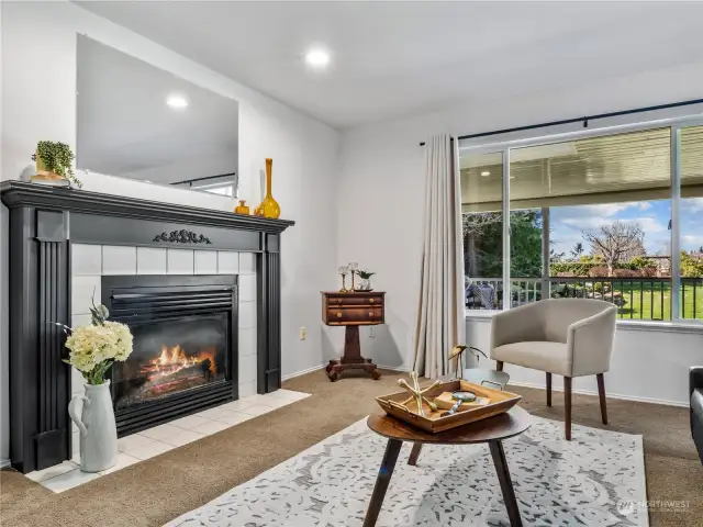 The family room is the perfect place to cozy up to a fire anytime.