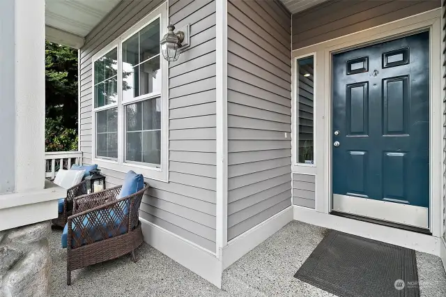 Enjoy relaxing in the covered front porch that welcomes you at the front entrance.